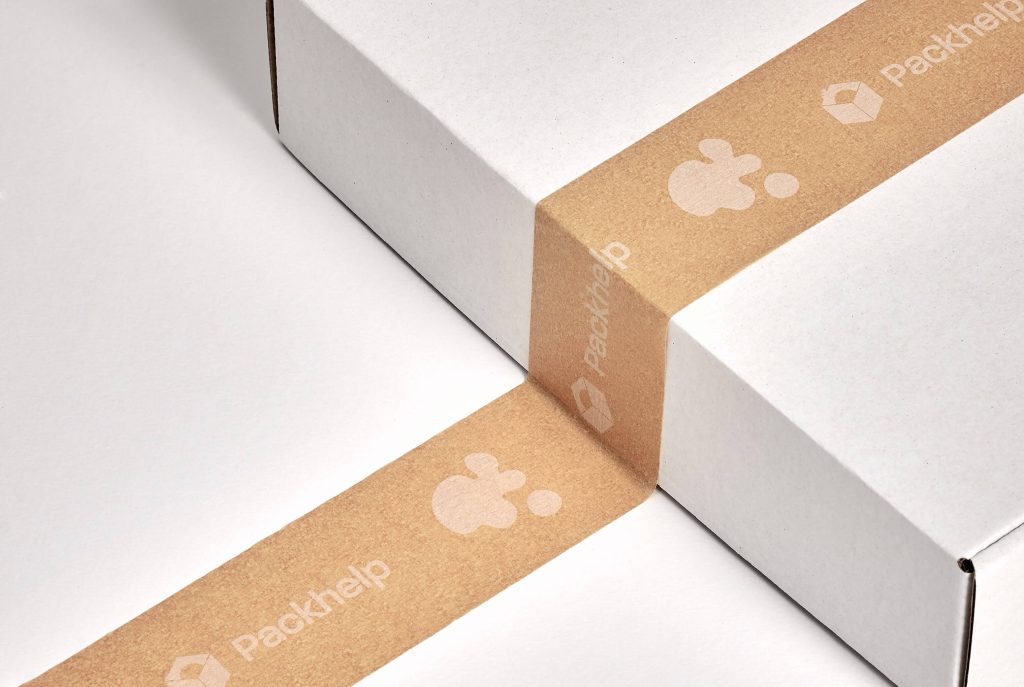 Eco-friendly packaging with cardboard box and kraft tape. 